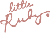 Decorative text 'little Ruby' in a cursive font on a white background